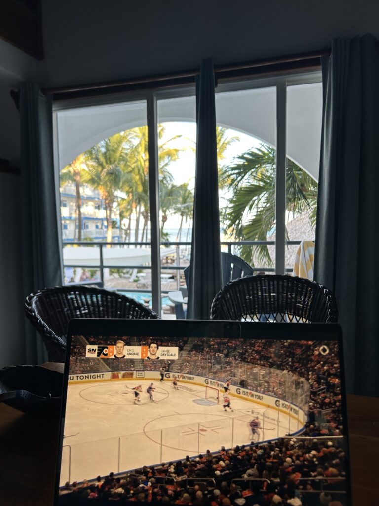 Belize Travel Guide - watching hockey on the deck !